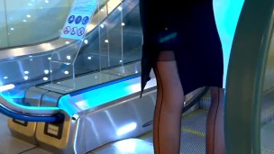 Girl in black nylons stockings with garters and high heels